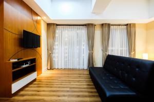 Exclusive 1BR Casa De Parco Apartment near AEON Mall By Travelio