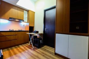 Exclusive 1BR Casa De Parco Apartment near AEON Mall By Travelio