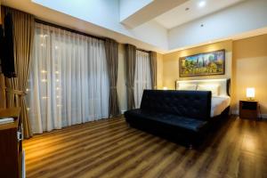 Exclusive 1BR Casa De Parco Apartment near AEON Mall By Travelio