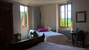 B&B / Chambres d'hotes Maison et Jardin Talinou : photos des chambres