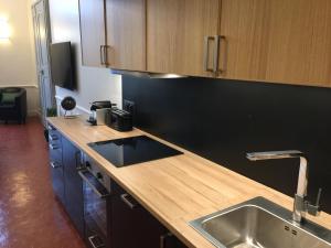 Appartements Les Suites du Cours & Spa : photos des chambres