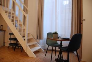 Appartements Le typique - coeur de ville : photos des chambres