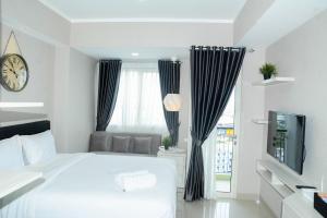 Sophisticated Studio at The Oasis Apartment By Travelio