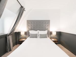 Appartements LivinParis - Luxury 2 & AC 3 Bedrooms Le Louvre : photos des chambres