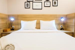 Modern Elegant Studio Grand Kamala Lagoon Apartment By Travelio