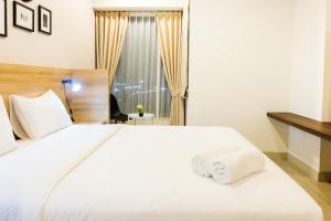 Modern Elegant Studio Grand Kamala Lagoon Apartment By Travelio