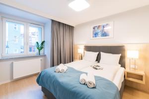 Q17 Apartments Rynek