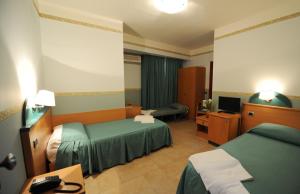 Triple Room room in Santa Lucia Hotel