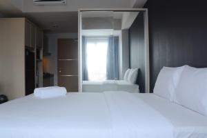 Strategic Studio Apartment The Oasis near Bekasi By Travelio