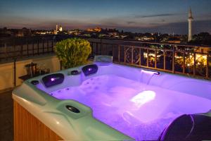 Master Suite with Outdoor Hot Tub (Forms of Light)