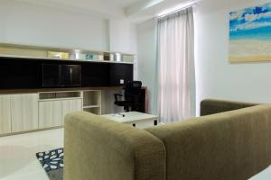 Studio Room Azalea Suites Apartment By Travelio