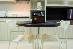 Studio Room Azalea Suites Apartment By Travelio