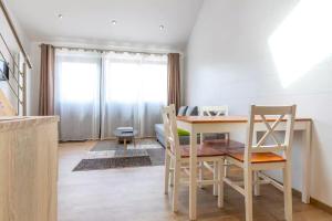 Domaine des Ecuries - Appartements meubles a Talloires : photos des chambres