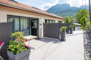 Domaine des Ecuries - Appartements meubles a Talloires : photos des chambres