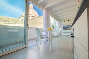 Attic with Balcony room in Le Cupole Suites & Apartments