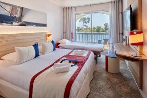 Hotels Hotel Club Le Plein Sud Vacances Bleues : photos des chambres
