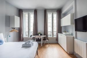 Appartements Apartments WS Saint-Lazare - Opera : photos des chambres