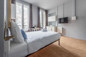 Appartements Apartments WS Saint-Lazare - Opera : photos des chambres