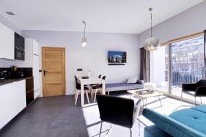 Appartements Les Cles du Clos : photos des chambres