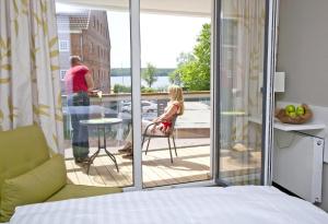 Double Room with Balcony room in Radlon Fahrrad-Komfort-Hotel