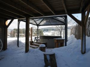 Chalets La jonquille jacuzzi et sauna : photos des chambres
