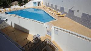 Apartamento com piscina perto da praia