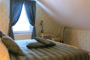 Amber House su sūkurine vonia