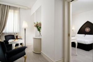 Superior Triple Room room in Palace Catania | UNA Esperienze