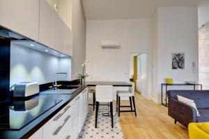 Appartements Les Halles et Hauteurs by Cocoonr : photos des chambres