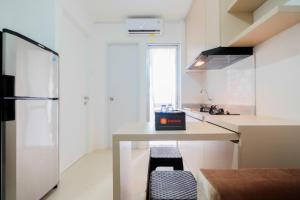 Luxurious 2BR City View at Bassura City Apartment By Travelio