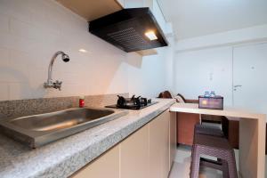 Luxurious 2BR City View at Bassura City Apartment By Travelio
