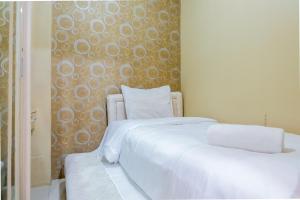 Affordable Price 2BR Green Pramuka City Apartment By Travelio