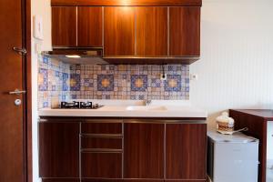 Simple Studio Signature Park Grande Apartment near MT Haryono By Travelio