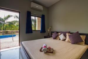 StayVista at Shubmann Villa with Pvt Pool & River View