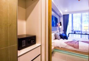 Oceanstone by Holy Cow, 2-BR, 60 m2, tree view