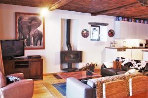 Appartements Ferme Saint-Aubin : photos des chambres