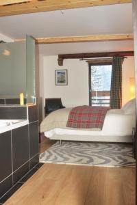 Appartements Ferme Saint-Aubin : photos des chambres