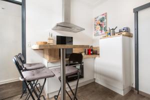 Appartements Cosy appartement proche Gares : photos des chambres