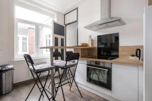 Appartements Cosy appartement proche Gares : photos des chambres