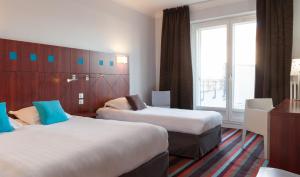 Hotels The Originals Boutique, Hotel Le Pariou, Issoire (Qualys-Hotel) : photos des chambres