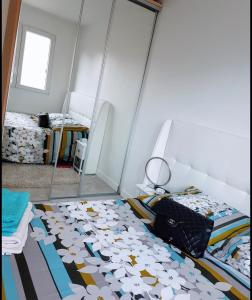 Appartements Tres joli appartement mignon confortable a Paris Villeneuve-la-Garenne : photos des chambres