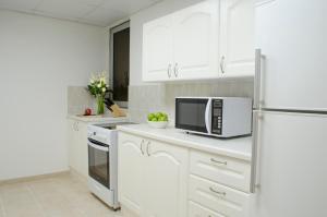 Deluxe Three-Bedroom Apartment room in The Apartments Dubai World Trade Centre Hotel Apartments