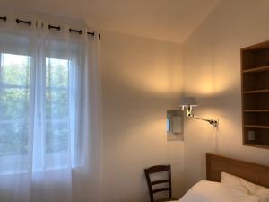 Appartements Appartement Parlementia, Domaine Koskenia : photos des chambres