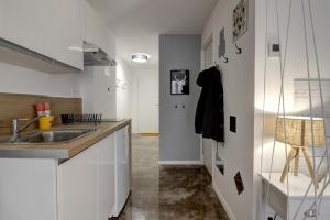 Appartements STUDIO LE MOUTARDE : photos des chambres