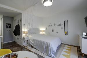Appartements STUDIO LE MOUTARDE : photos des chambres