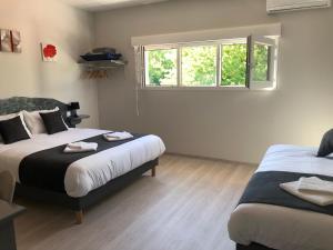 B&B / Chambres d'hotes L’ile aux Bateaux : Chambre Familiale - Vue sur Jardin