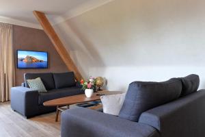 Appartements Gite Aux Deux Clochers : photos des chambres