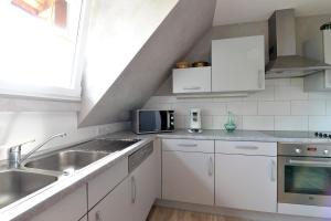 Appartements Gite Aux Deux Clochers : photos des chambres