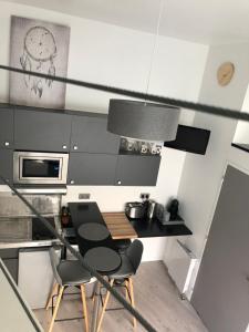 Appartements 2 Lofts Cosy de cachet idealement situes au Centre Ville de Clermont-Ferrand : photos des chambres