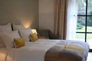 B&B / Chambres d'hotes Les Enclos Bed and Breakfast a 4 mn de Chantilly : photos des chambres